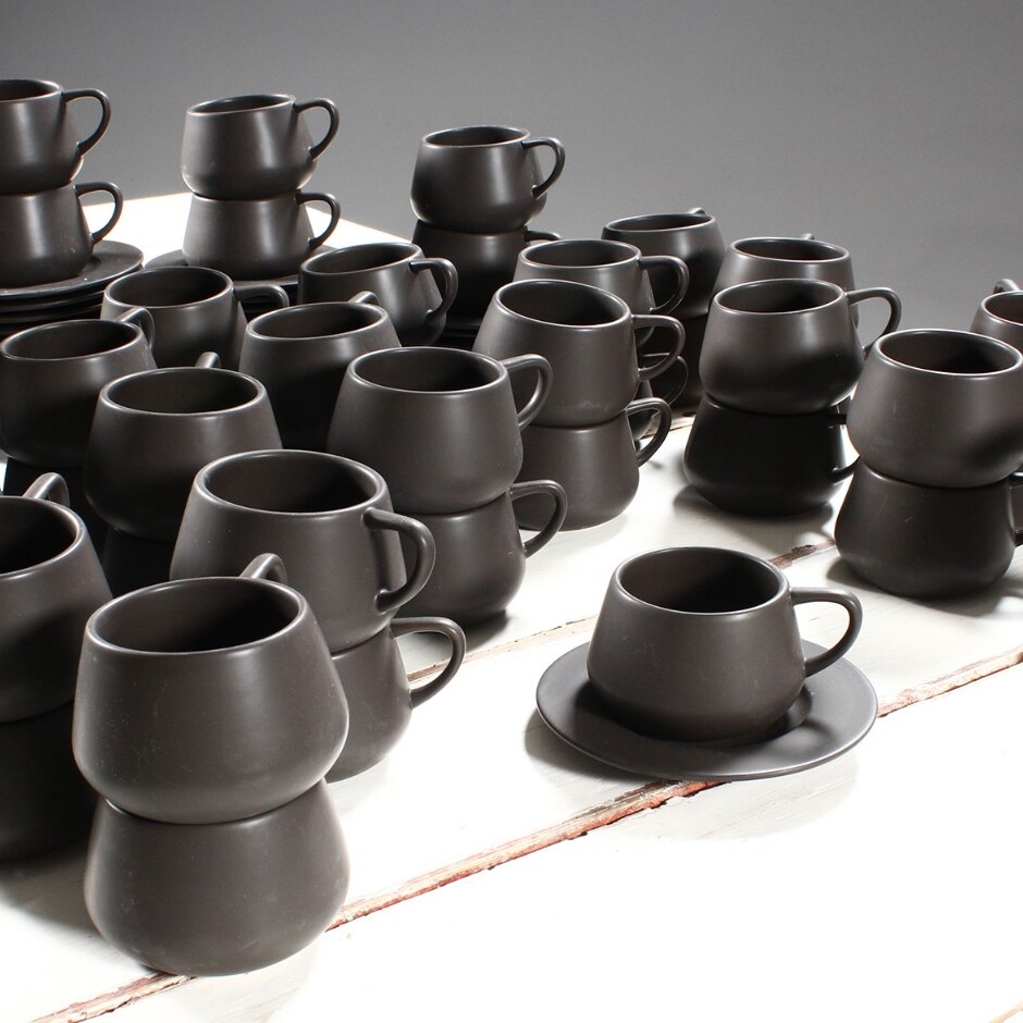 Design by Anna Elzer Oscarson. 24 kopper samt underkopper (48 ...
