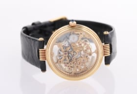 Alfred Dunhill. Skeleton armbåndsur af 18 kt guld, 1990'erne