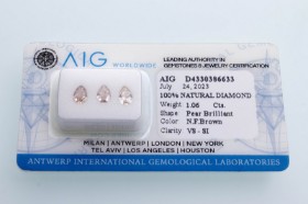 Three AIG-certified brilliant-cut diamonds of 1.06 ct. (3)