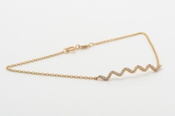 Armlænke med cubic zirkonia. 8 kt. guld