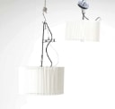 Lluís Porqueras for Claris: A pair of ceiling lamps Mobles 114, glass with folding shades