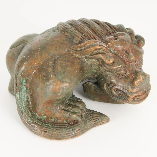 Chinese figure of a reclining tiger. Tang dynasty | Lauritz.com
