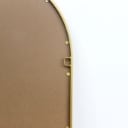 Mirror with curved top, gold-colored iron frame. 125x85 cm