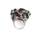 Svend Valdemar Nielsen: An amber ring and a pair of ear studs of sterling silver. Size 52. (3)