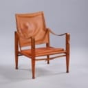 Kaare Klint. Safari chair with seat cushion in cognac leather.