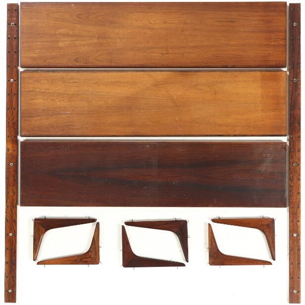 Danish furniture manufacturer. Wall-mounted shelf made of rosewood