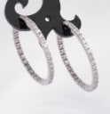 A pair of brilliant-cut diamond hoop earrings in 18 kt. white gold, 0.70 ct. (2)