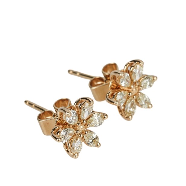 Pair of 18 kt flower earrings with diamonds, approx. 0.59 ct.