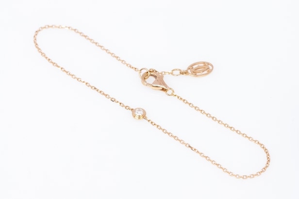 Cartier. Cartier d´Amour XS bracelet in pink gold with brilliant, approx. 0.04 ct.
