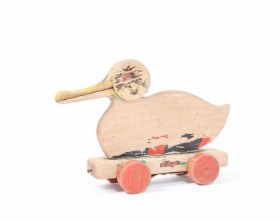 LEGO. Painted wooden duck on wheels with 'rap' sound