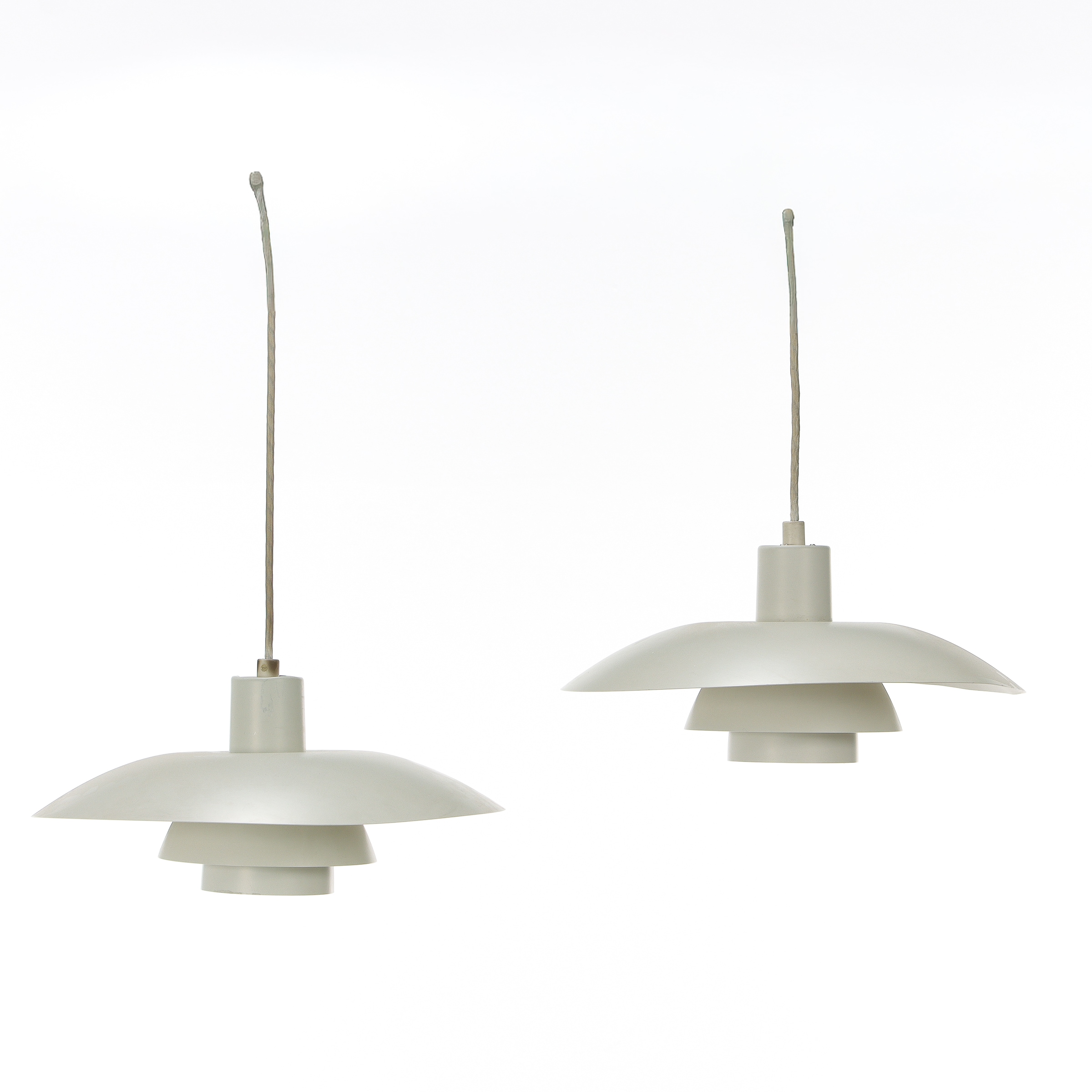Poul Henningsen. A pair of PH4/3 pendants. (2)