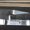 Poul Kjærholm. Lænestol model PK25, stål og flagline 