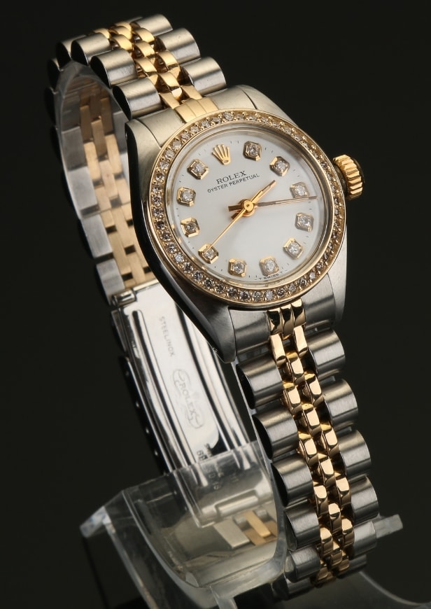 Rolex dameur i 18 karat guld/stål med Diamanter
