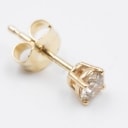 A natural brilliant earring made of 14 kt gold 0.16 ct
