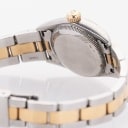 Rolex Oyster Perpetual dameur af 18 kt. guld og stål ref. 67183