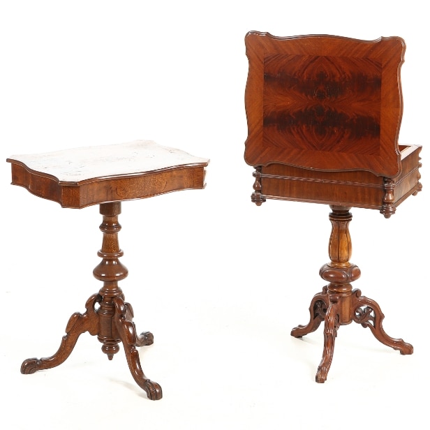 Two sewing tables of mahogany and dark stained wood, late 19th century. (2)