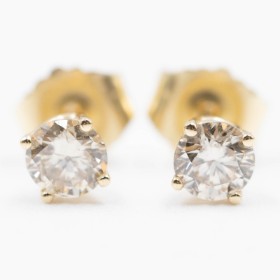 Pair of brilliant earrings in 14 kt gold, 0.33 ct. (2)