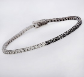 Tennis bracelet with white and black diamonds in 18 kt. white gold and black rhodium-plated gold, 0.95+1.12 ct.