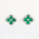 A pair of emerald and diamond ear studs of 18k white gold. (2)