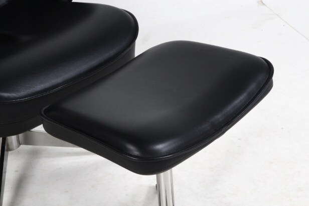 Roger Persson for Swedese. High-backed armchair and stool (2)
