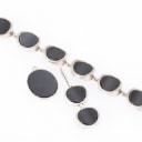 N.E. From: An onyx jewellery set of sterling silver. (3)