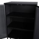 Daneline. Display cabinet in black painted perforated metal.