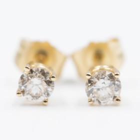 Pair of brilliant earrings in 14 kt gold, 0.33 ct. (2)