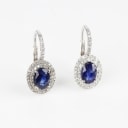 A pair of sapphire and diamond ear pendants of 18k white gold. (2)