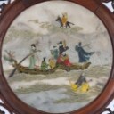 Chinese two-sided porcelain painting mounted in a carved wooden frame on a foot