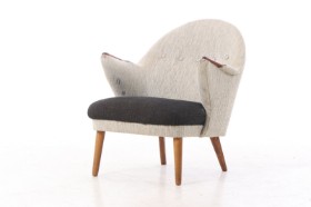 Danish furniture design. Upholstered armchair with teak 'nails', 1950s