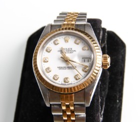 Rolex Oyster Perpetual Datejust guld og stål damearmbåndsur fra 1990.