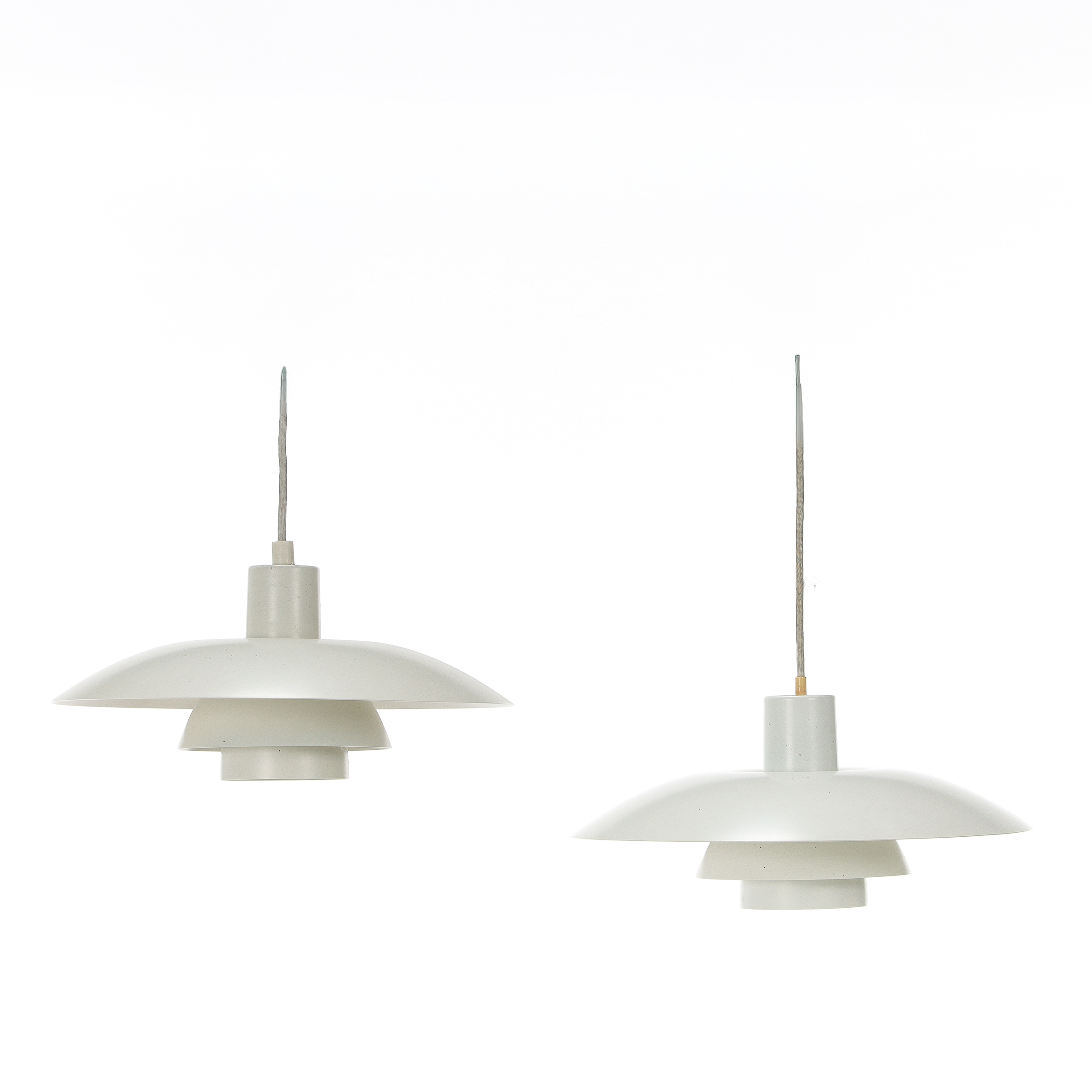Poul Henningsen. A pair of PH4/3 pendants. (2)