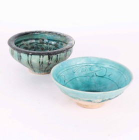 Two Persian bowls, pottery with turquoise glaze, a rep.