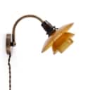 Poul Henningsen. Wall lamp with PH 1/1 amber shades