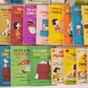 Samling vintage engelsksprogede Peanut's bøger og Andy Cap albums. (33)