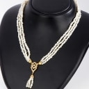 Italian three-row freshwater pearl necklace with diamond pendant and 18 kt. gold clasp