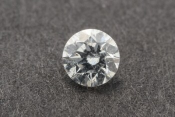 Uindfattet brillant på ca. 0.18 ct.  W/P