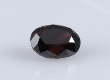 Uindfattet oval diamant, 0.66 ct., Dark Brown