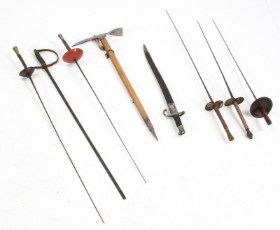 Collection of bladed weapons and WWll Aschenbrenner ice axe