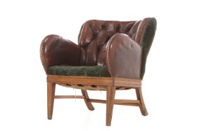 Clubchair / armchair upholstered in deep stitched leather, mid-20th century