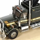 Tamiya. 56336 King Hauler truck, 56302 Semi-Trailer trailer + Carson Reflex Stick 2 remote control, in transport boxes. (2)