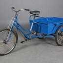 Budcykel med lad.