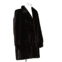 Short coat made of mahogany-colored mink. Approx. size M.