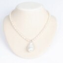A pearl necklace and gemstone bracelet. (2)