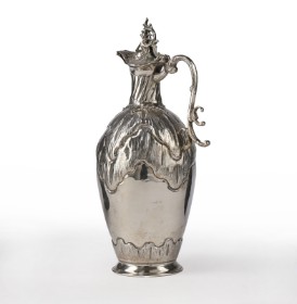 Silver wine jug in rococo form