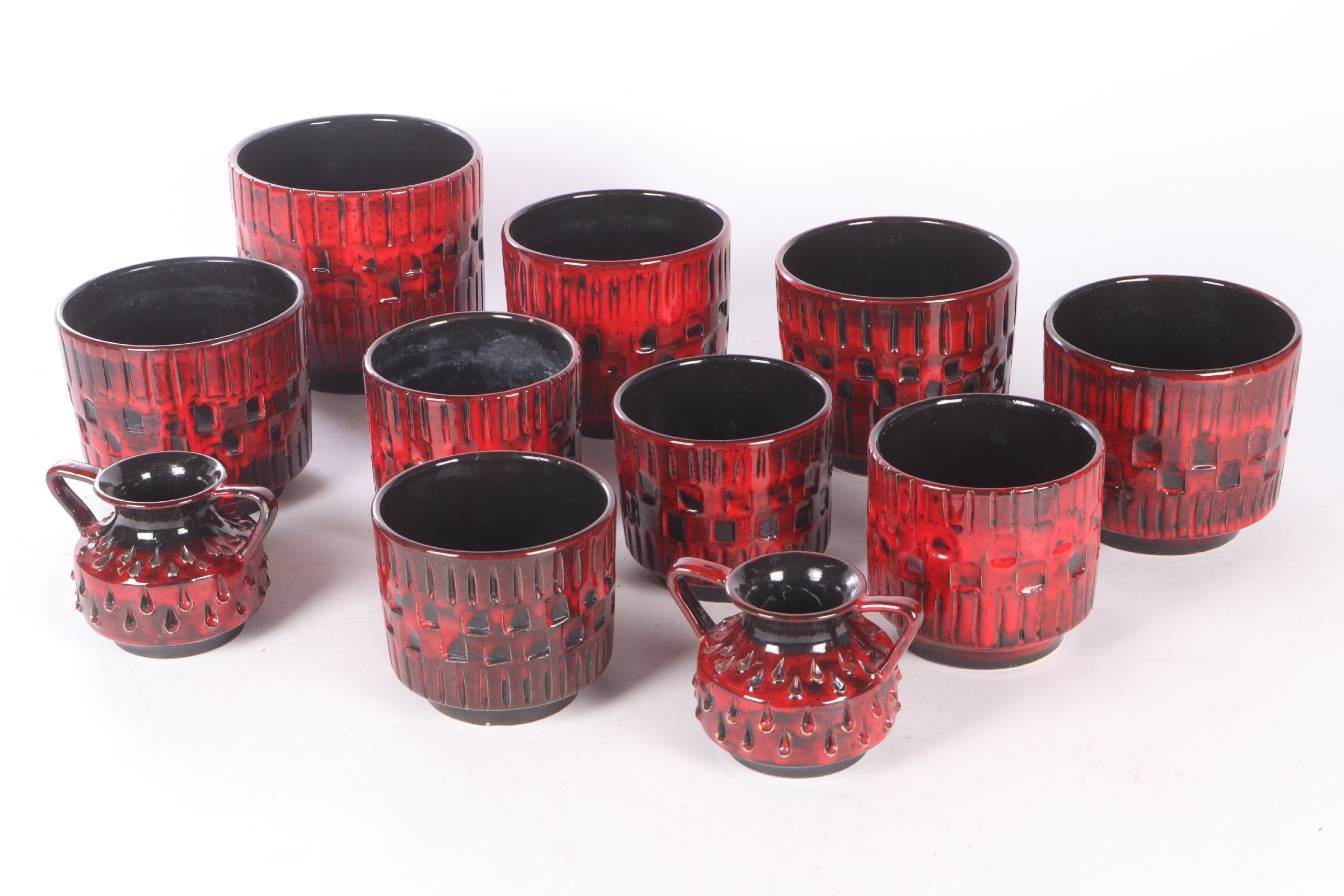 Fratelli, Italy. Collection of pot covers and two vases. (11)