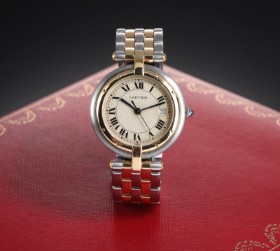 Cartier 'Panthère Ronde'. Dameur af 18 kt. guld og stål med lys skive, 1990'erne