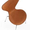 Arne Jacobsen. A set of 8 chairs 'Seven', model 3107, Vacona cognac aniline leather (8)