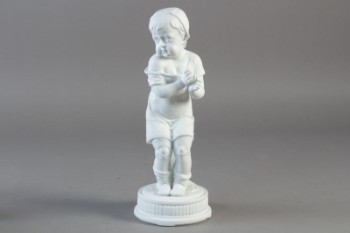 Figur af bisquit iform af lille pige