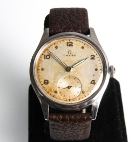 Omega. Vintage men's watch in steel, approx. 1947